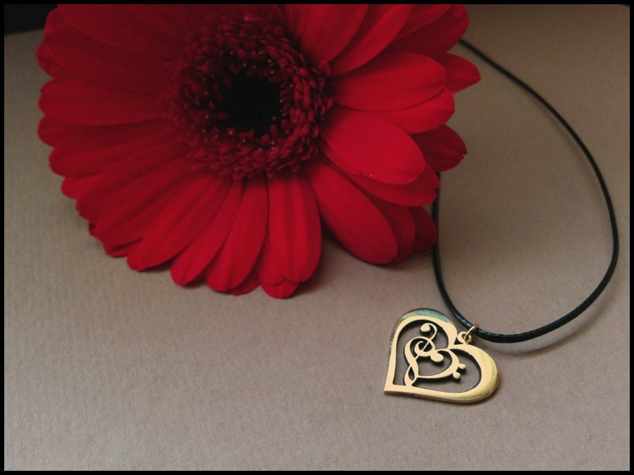 Treble & Bass Clef Heart Pendant made from brass