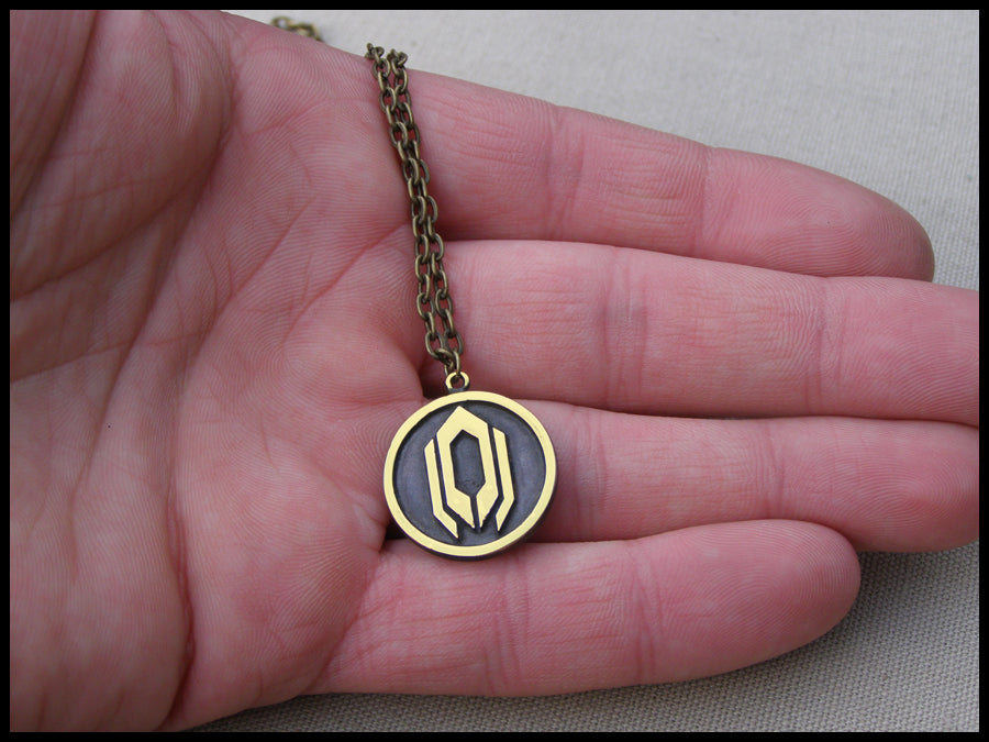 Collier pendentif amulette Cerberus de Mass Effect